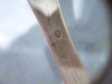 a close up of a spoon with a fork inside of it