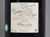 a bottle of wine with a map on the label