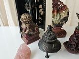 a lot of figurines that are on a table