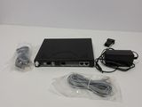 an image of a laptop computer with a power cord and charger