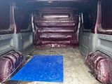 a blue mat in the back of a van