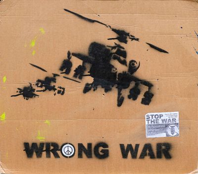 a cardboard box with a drawing of a war scene on it