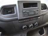 a dashboard of a car with a radio and other controls