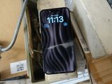 a phone that is sitting in a box on a table