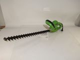 a green hedger that is sitting on a table