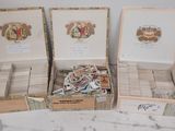 three boxes that are sitting on a marble table