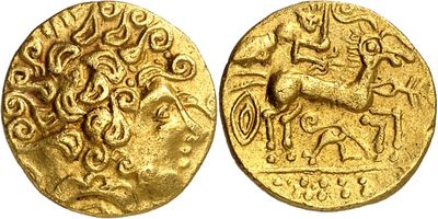 a gold coin with an image of a man on a horse