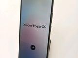 a close up of the back of a phone with a camera on top of it