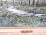 a painting of a stream running through a forest