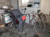 two bicycles that are parked in a garage