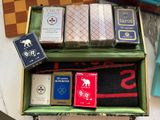a box of playing cards sitting on top of a table