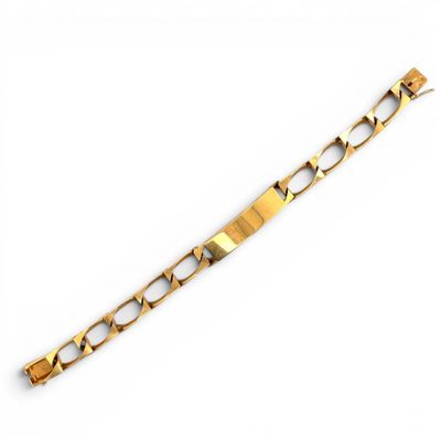 an image of a gold bracelet on a white background