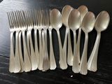 a lot of spoons that are on a table