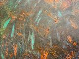 une peinture à l'huile représentant un champ d'herbe avec des feuilles orange et vertes