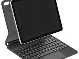 une image représentant une tablette équipée d'un clavier posé dessus