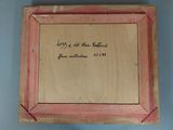 an old picture of a wooden frame with writing on it