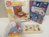 a hello kitty doll and other toys on a table