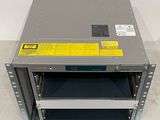 an image of a metal rack with a yellow label on top of it