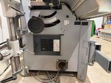 a machine that is sitting on the floor in the room