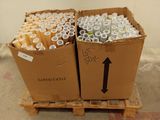two boxes of beer sitting on a pallet in a warehouse