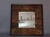 a picture of a picture of a city in a picture frame