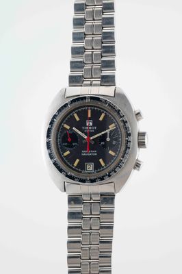 a close up of a watch on a white background