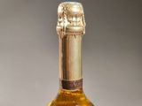 a bottle of wine that is sitting on a table