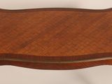 an image of a small table with a wooden top on a white background