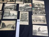 several old black and white photos of a city street and buildings