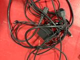 a bunch of wires that are laying on a red surface