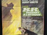 an old movie poster of a man with a gun in his hand
