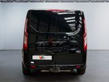 a black van that is parked in a garage