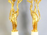 pair of gilded bronze and marble vases with flowers on marble bases