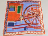 orange and blue scarf with a picture of a horse drawn carriage on it