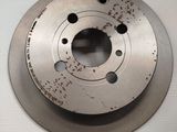 an image of a close up of a metal disc