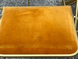 an image of a chair with a cushion on top of it