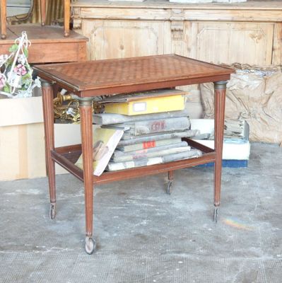 a small table with a bunch of books on it