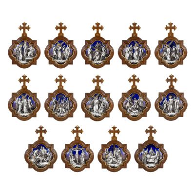 twelve blue and white religious plaques with crosses and crosses
