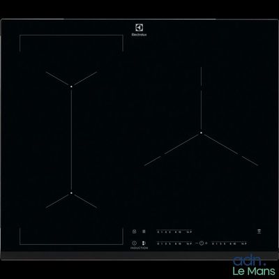 une image montrant un gros plan d'une plaque de cuisson sur fond noir
