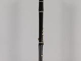 an image of a black and silver pen on a clear stand