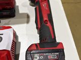 two tools that are sitting on a table