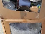a cardboard box that has a bunch of items inside of it
