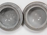 pair of gray glazed bowls with cracky rims on white background