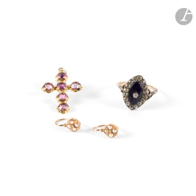 two pairs of earrings with pink and black stones on a white background