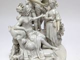 an image of a statue of a group of people on a white surface