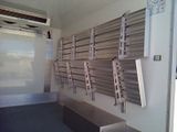 a wall that has a bunch of metal bars on it
