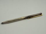 an image of a pen on a white surface