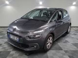 the grey citrole is parked on a checkered tile floor