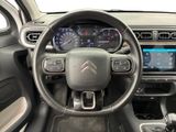 the interior of a car with a steering wheel, dashboard, and dash board
