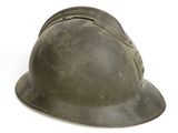 an old helmet on a white surface with a white background